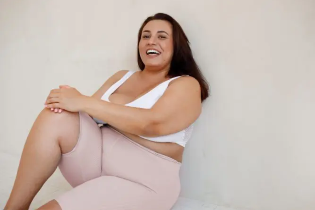 pretty female with belly fat - featured image